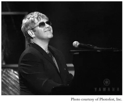 Photo of pop superstar and pianist Elton John